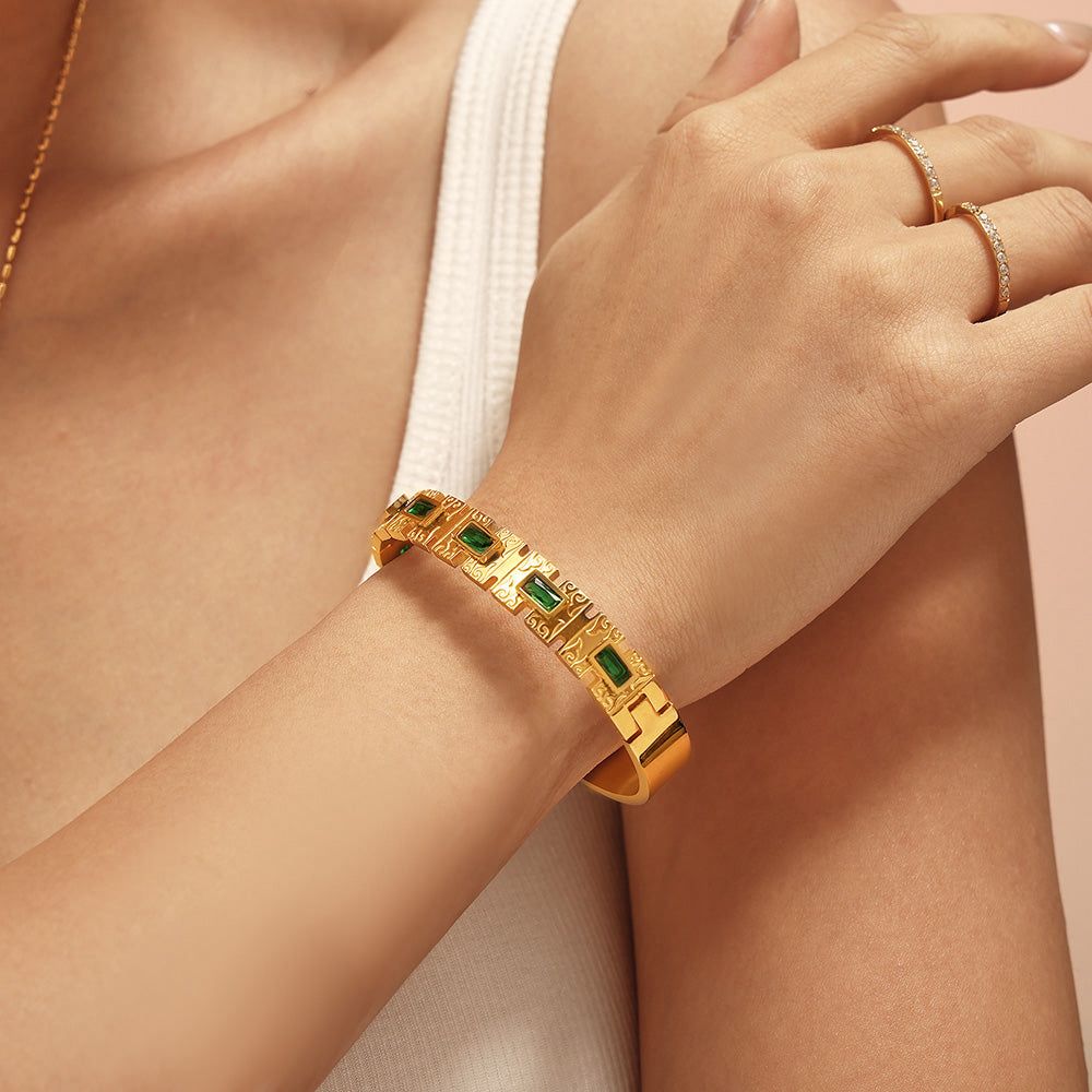 Vintage Gold Engraved Bangle with Emerald Green Baguette Stones