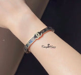 Chanel-Inspired Gold Bangle – Elegant Stainless Steel Bracelet