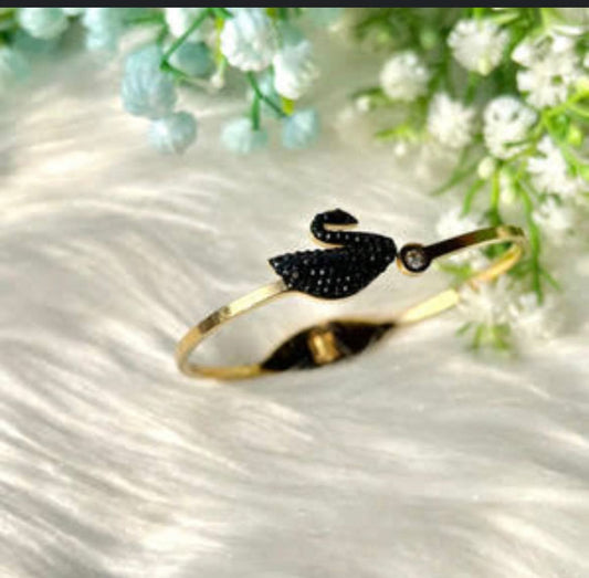 Black Swan Gold Bangle – Elegant Gold Bangle with Black Swan Detail