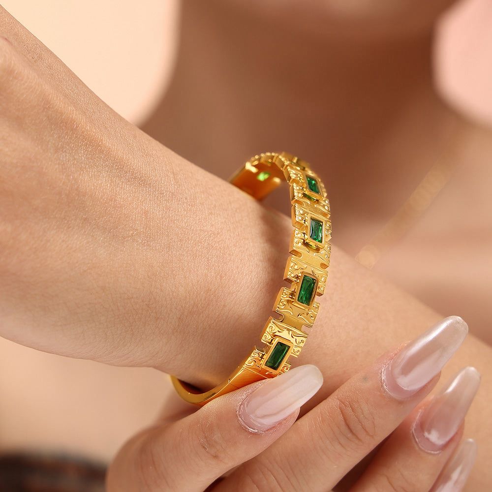 Vintage Gold Engraved Bangle with Emerald Green Baguette Stones