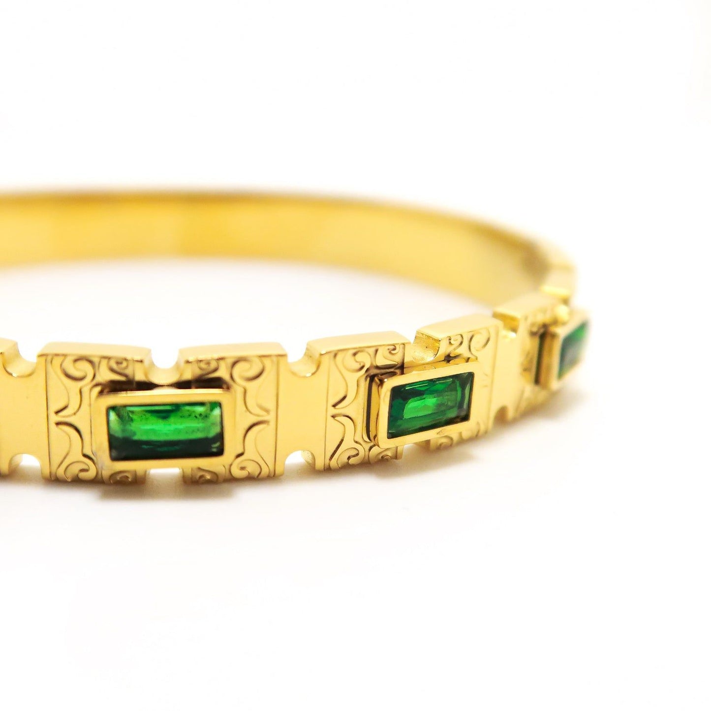 Vintage Gold Engraved Bangle with Emerald Green Baguette Stones