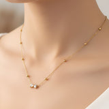 Minimal Gold Beaded Chain Necklace with Dual Crystal Pendant