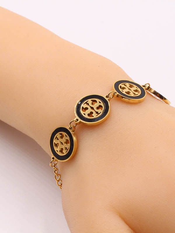 Tory Burch Gold Bracelet – Elegant & Timeless Stainless Steel Jewelry - Crazy Women