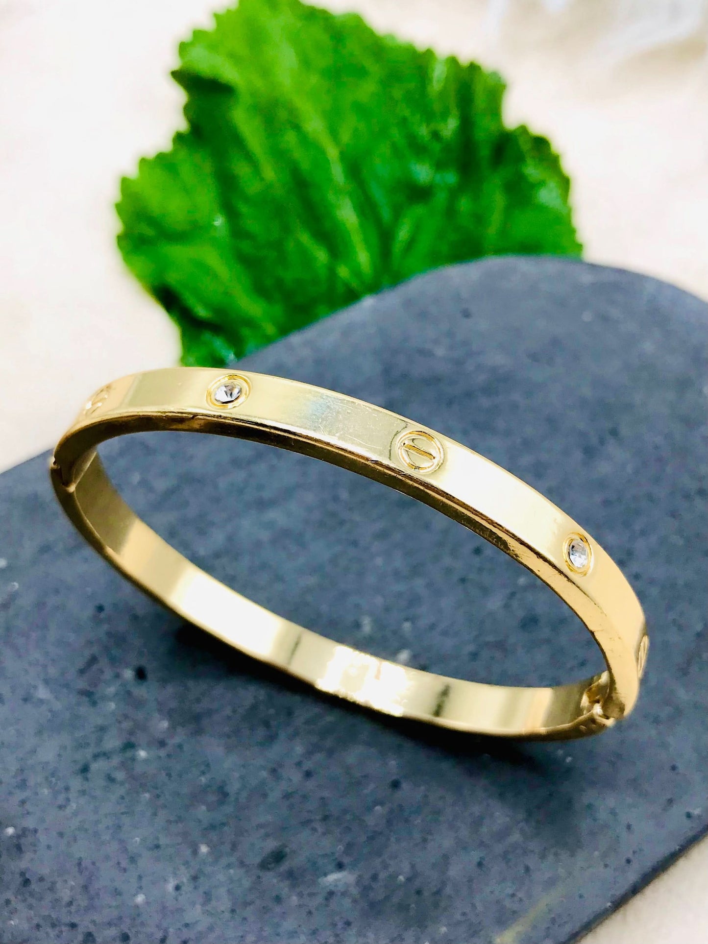 Cartier Gold Stone Bangle – Luxurious and Timeless Bracelet for Women