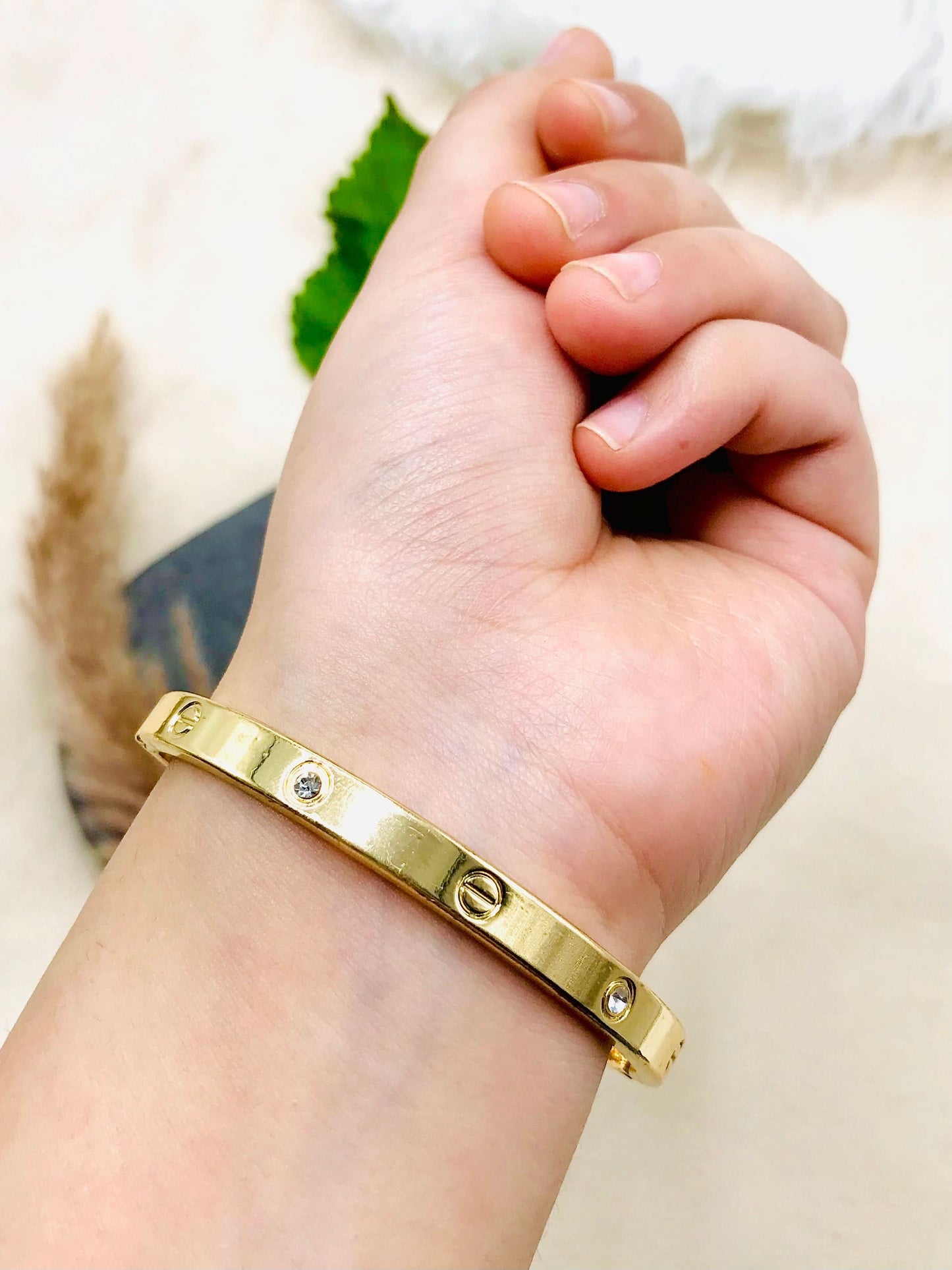 Cartier Gold Stone Bangle – Luxurious and Timeless Bracelet for Women